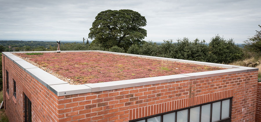 An insulated green rubber roof on a home in Staffordshire