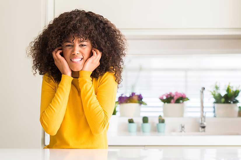 Woman who needs soundproofing to block out noise from neighbours