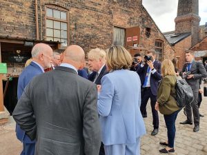 Ron Fox speaking to Prime Minister Boris Johnson alongside other Business Owners at Middleport Pottery