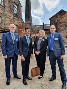 Ron Fox (left) with the Chancellor of the Exchequer, Rishi Sunak and other business owners outside Middleport Pottery.