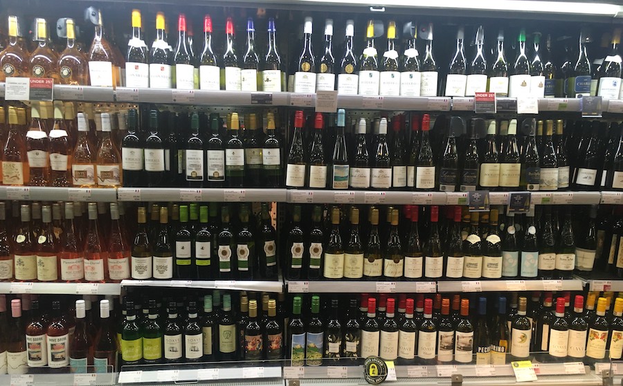 Wine bottles on a supermarket shelf