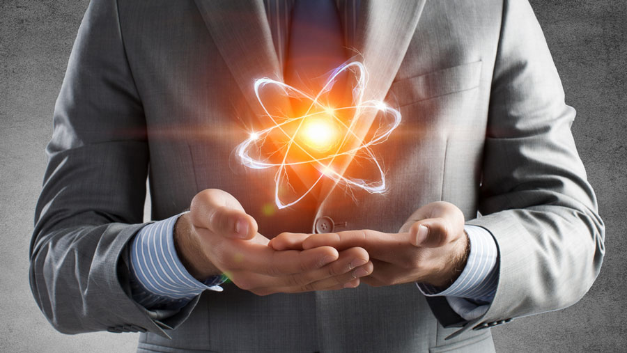 Atom in a man's hands.