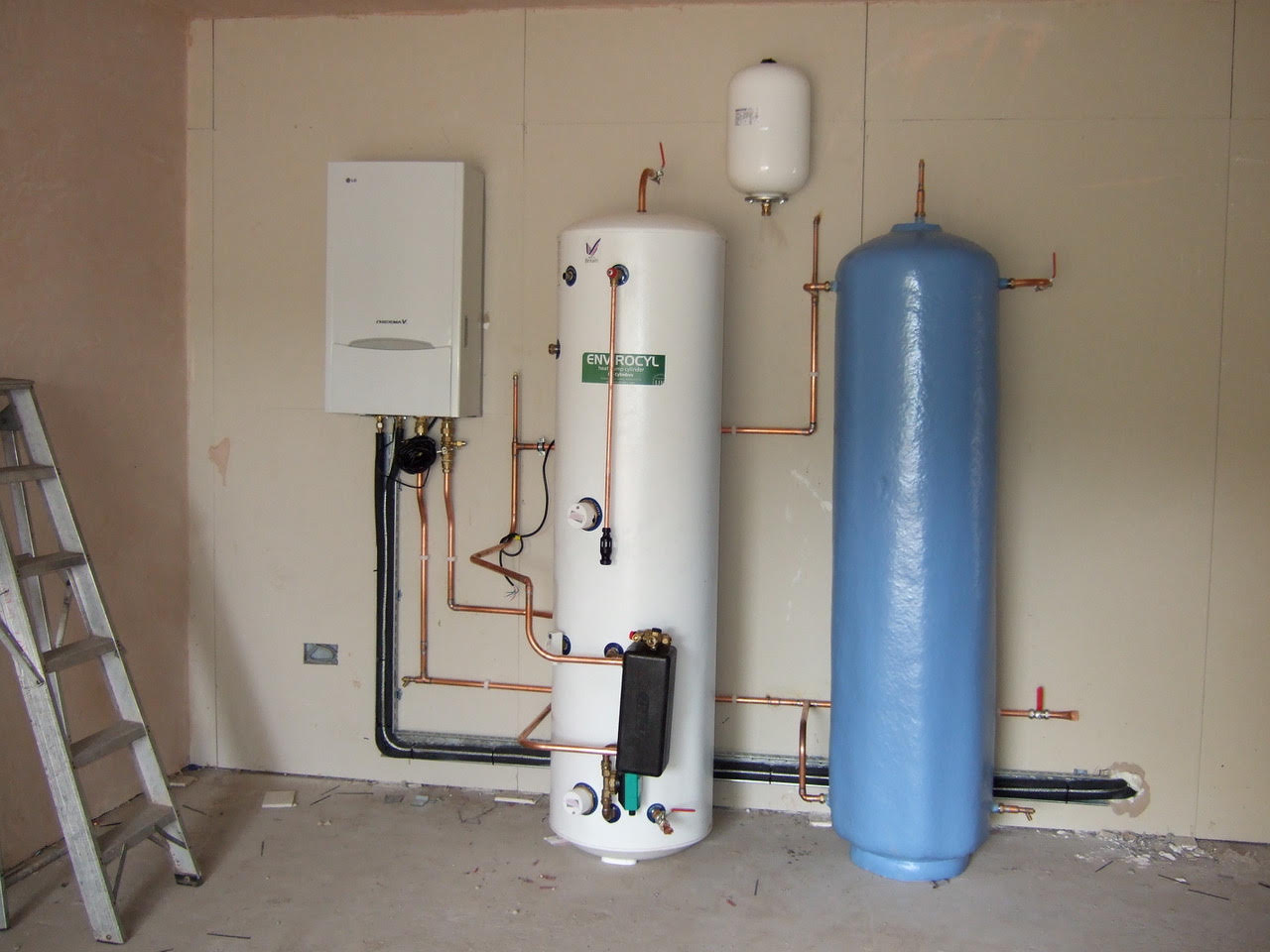 A cool idea – installing air conditioning during a hot summer. Picture: Ron Fox
